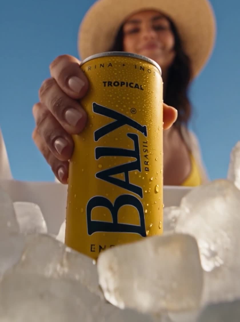 A Baly Tropical can on ice at a beach party